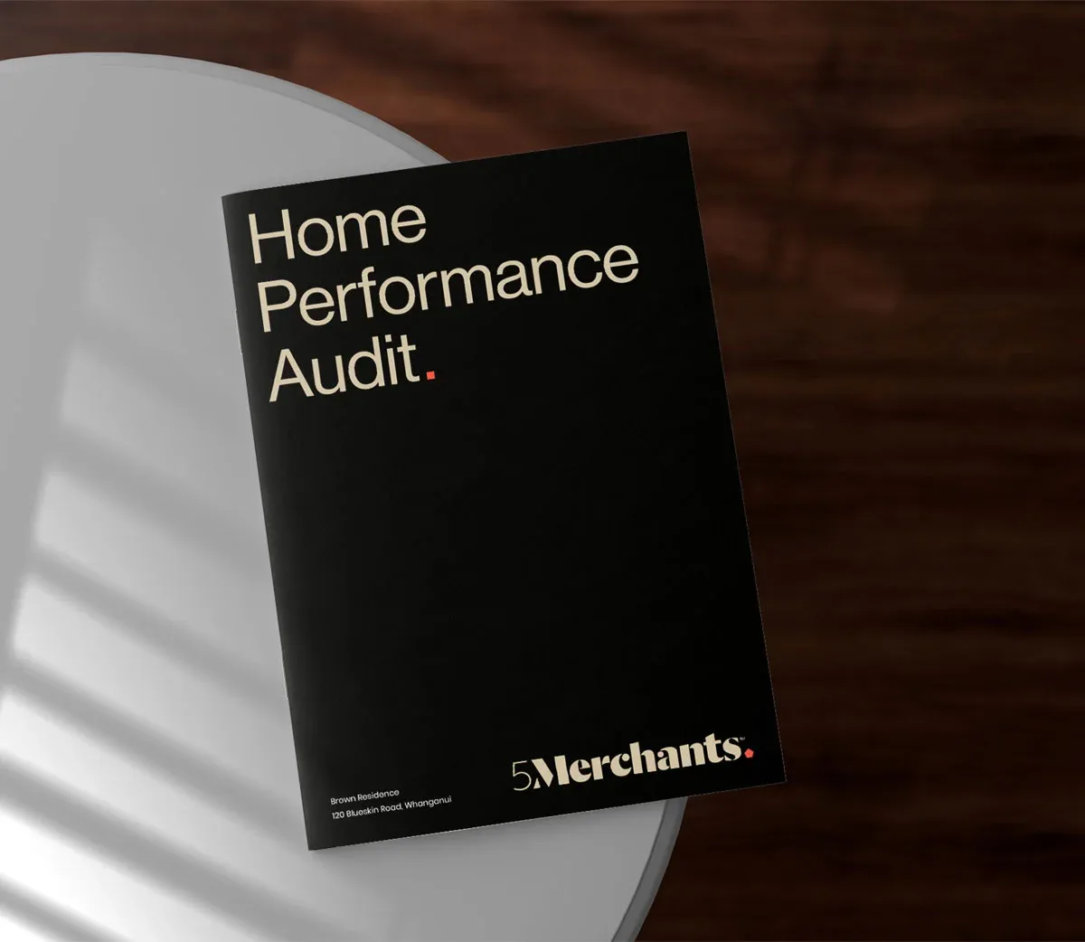 Home Performance Audit book by 5merchants resting on table